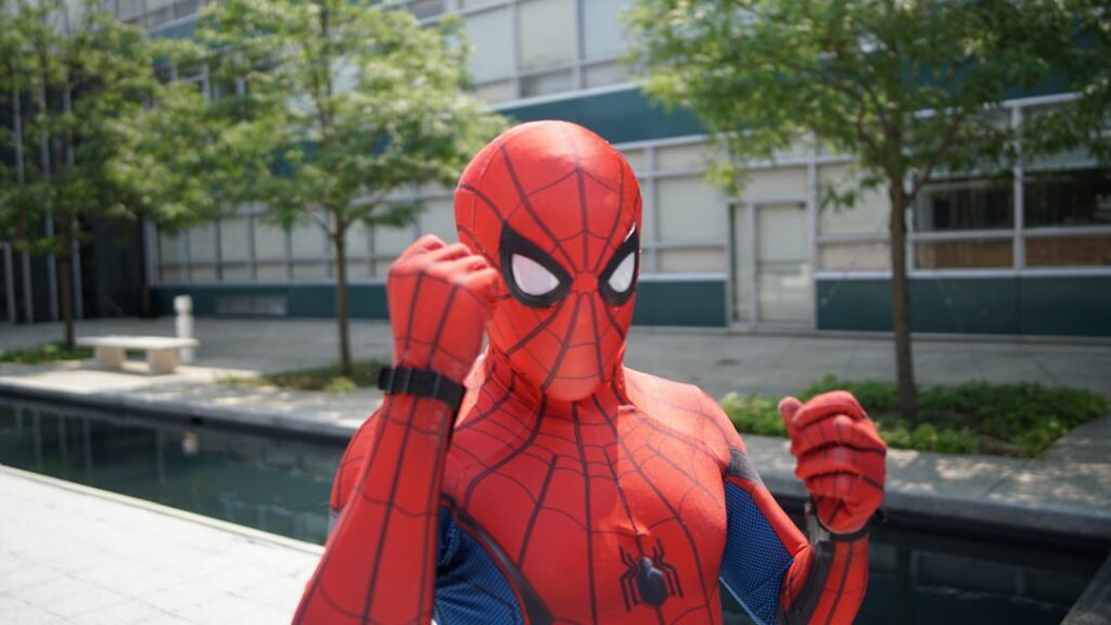 close up of spiderman posing as estate planning attorney